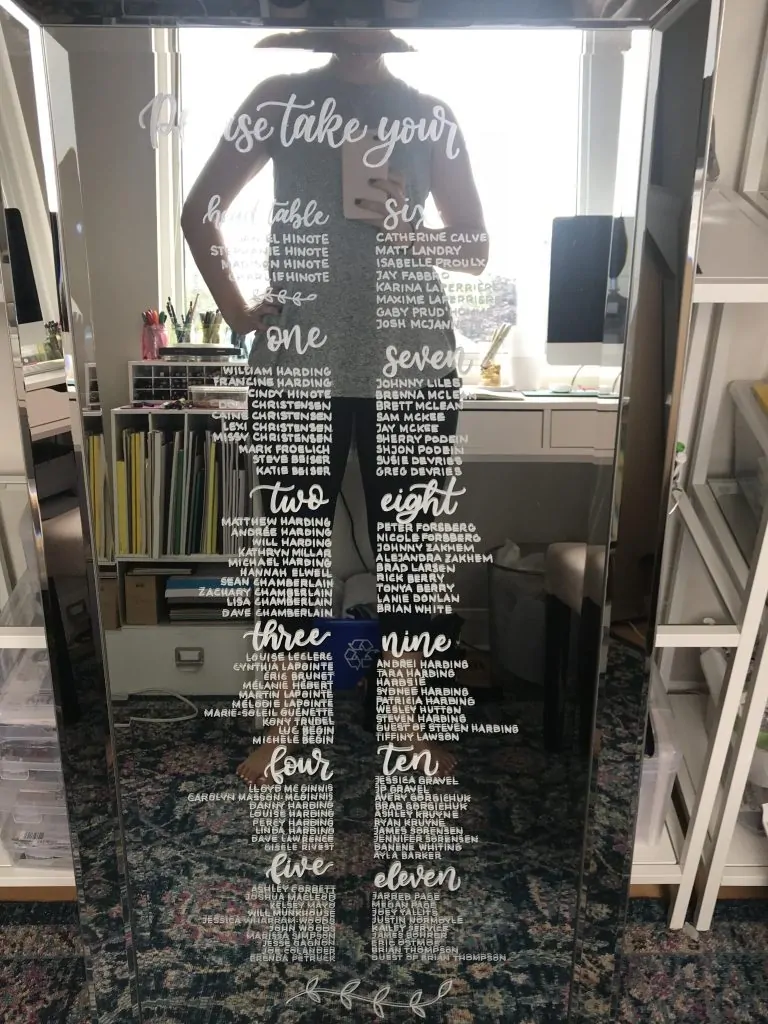 wedding seating chart on a mirror